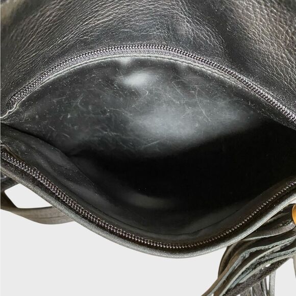 Tignanello Black Leather Crossbody Shoulder Bag Tassel Charm Pockets Adjustable - Picture 13 of 16